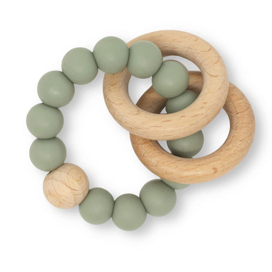 Teething ring with green silicone beads and wooden rings on a white background