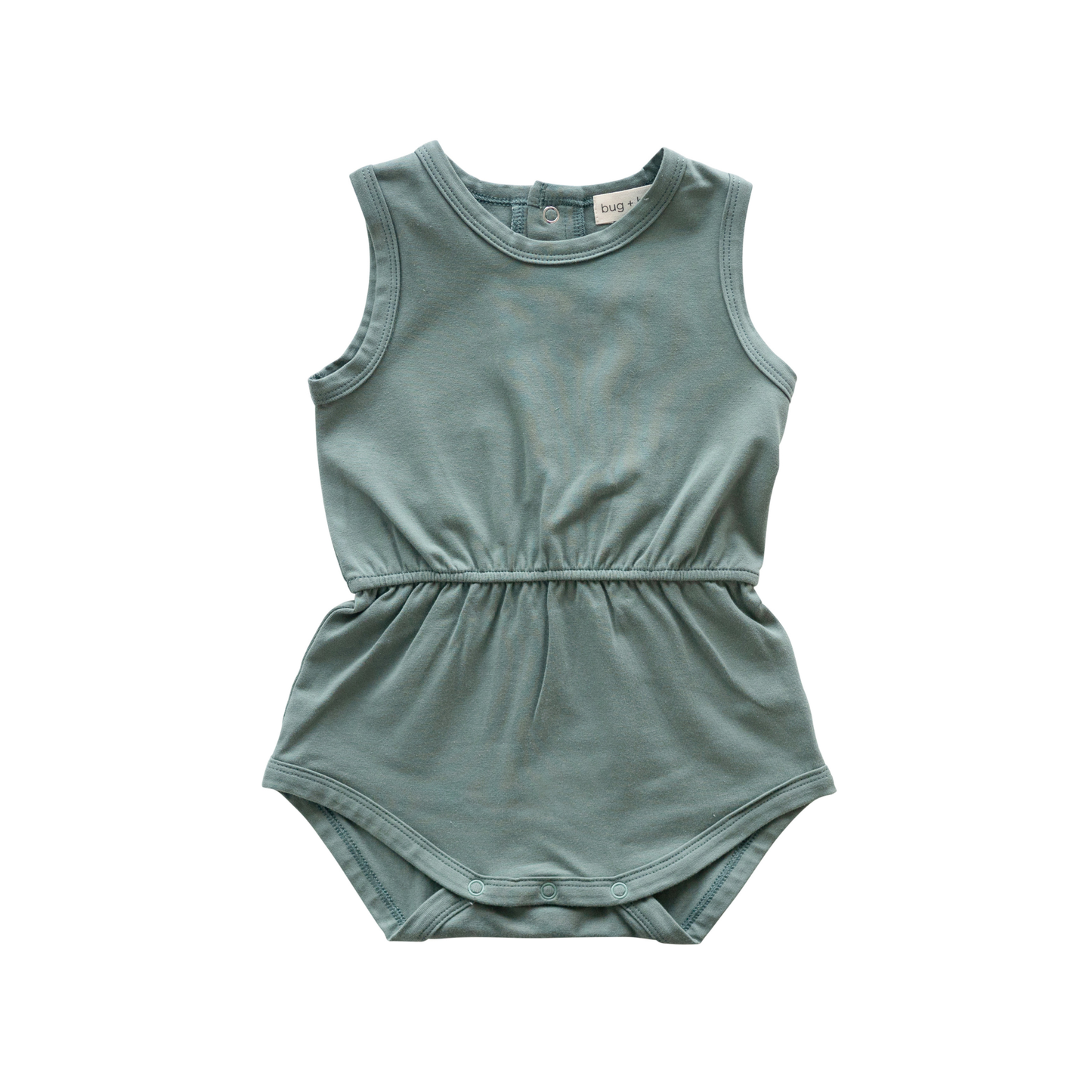 Green baby romper on a white background