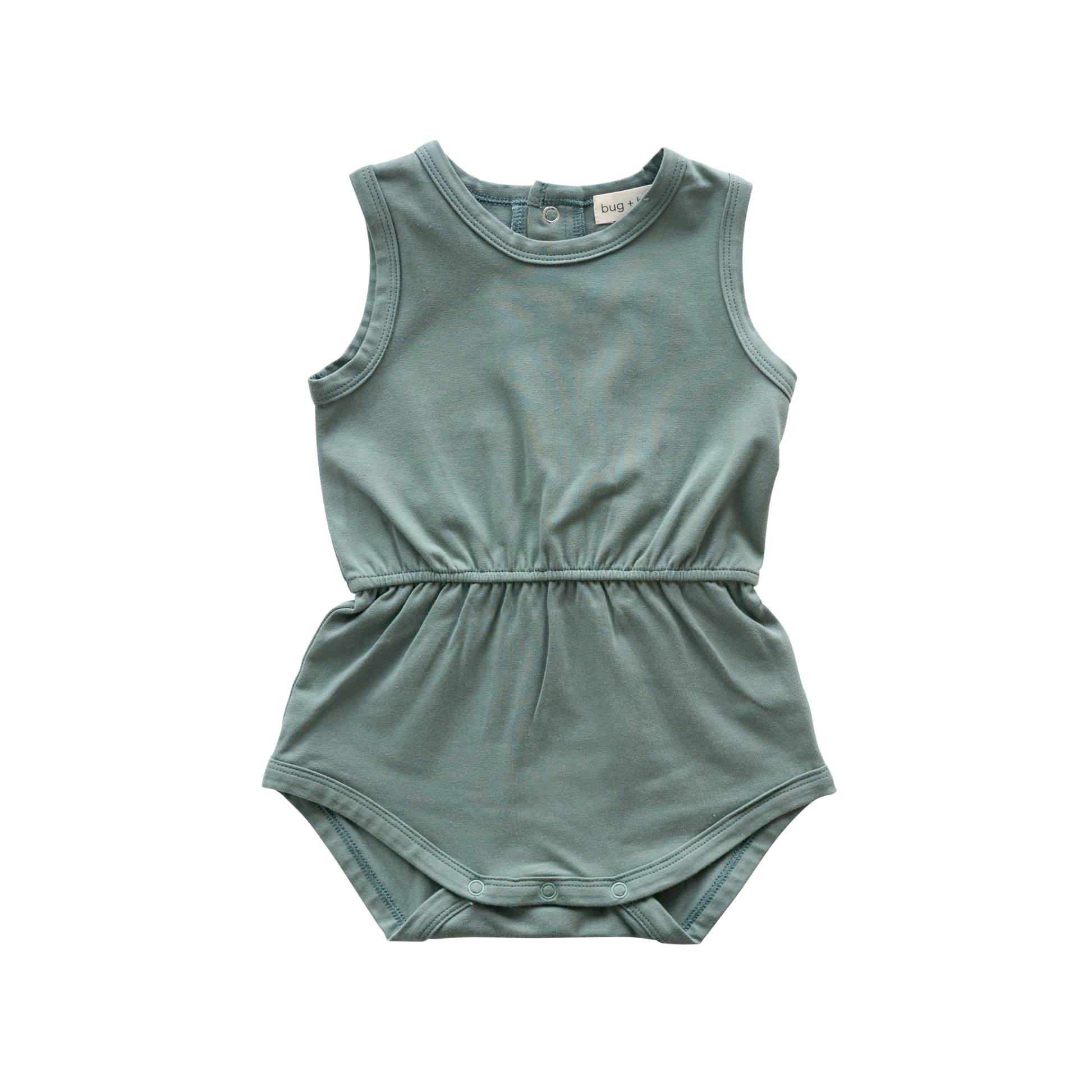 Green baby romper on a white background