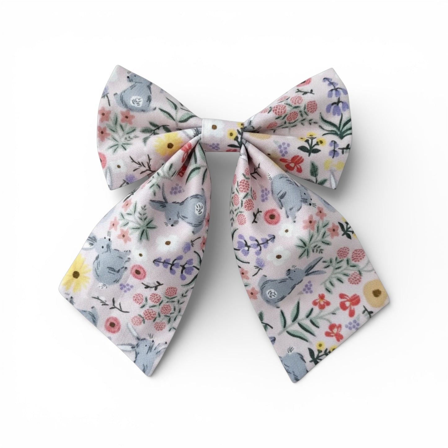 Floral patterned with bunnies bow on a white background