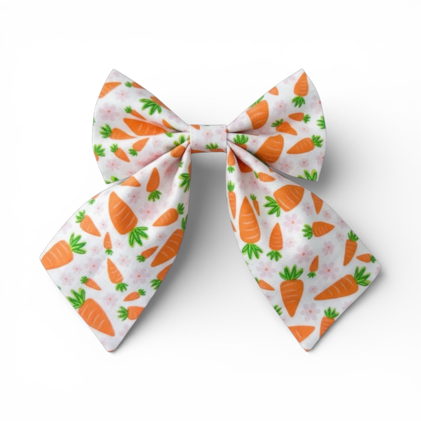 fabric bow with carrot pattern on a white background