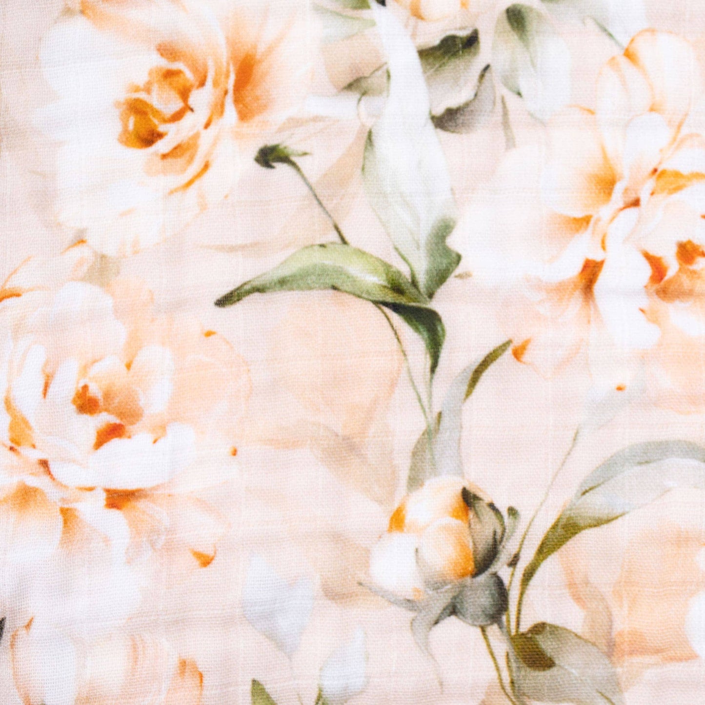 Close-up of a floral pattern with white and peach-colored flowers on a light background.