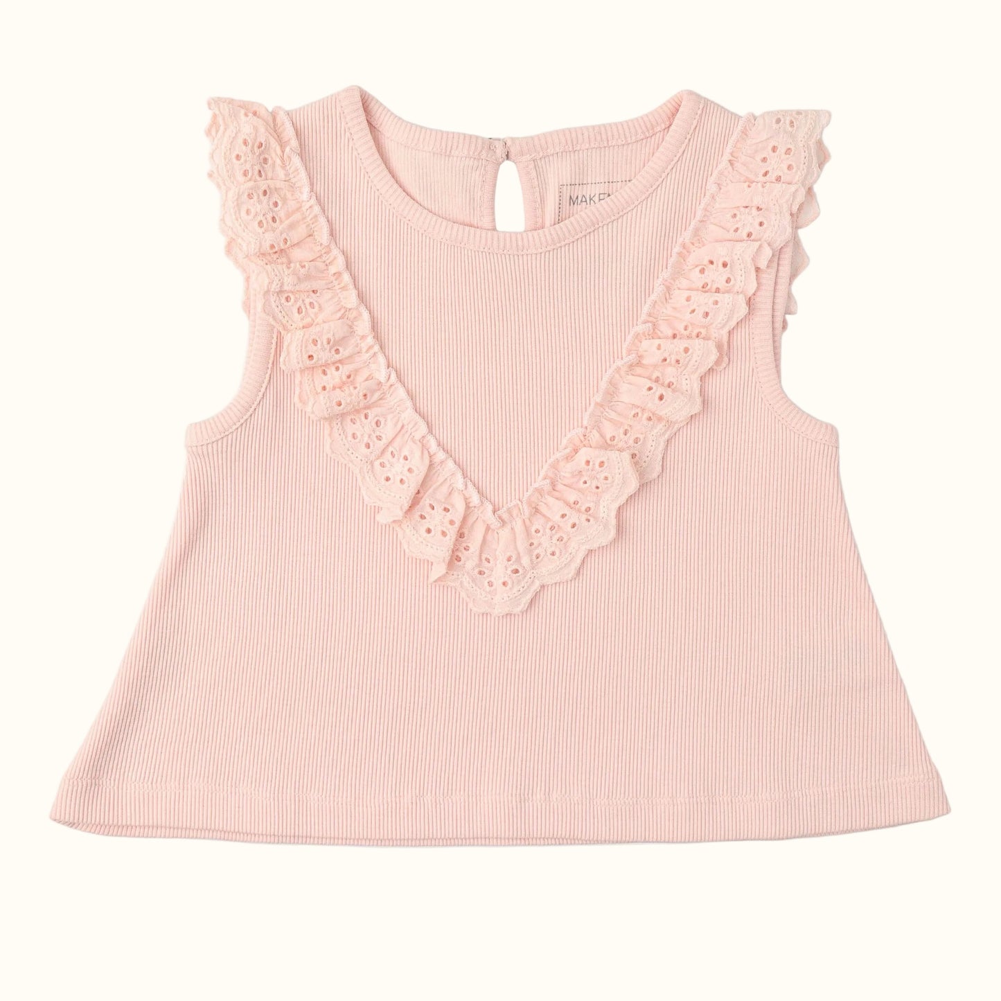 Pink sleeveless top with lace details on a white background