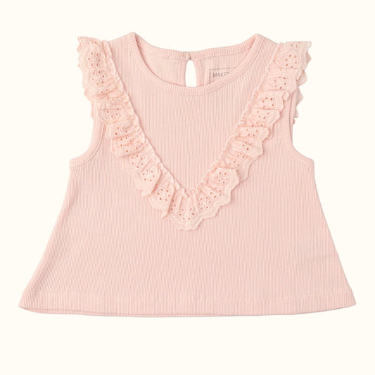 Pink sleeveless top with lace details on a white background